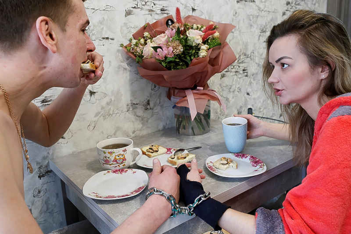 Couple handcuff themselves together for three months